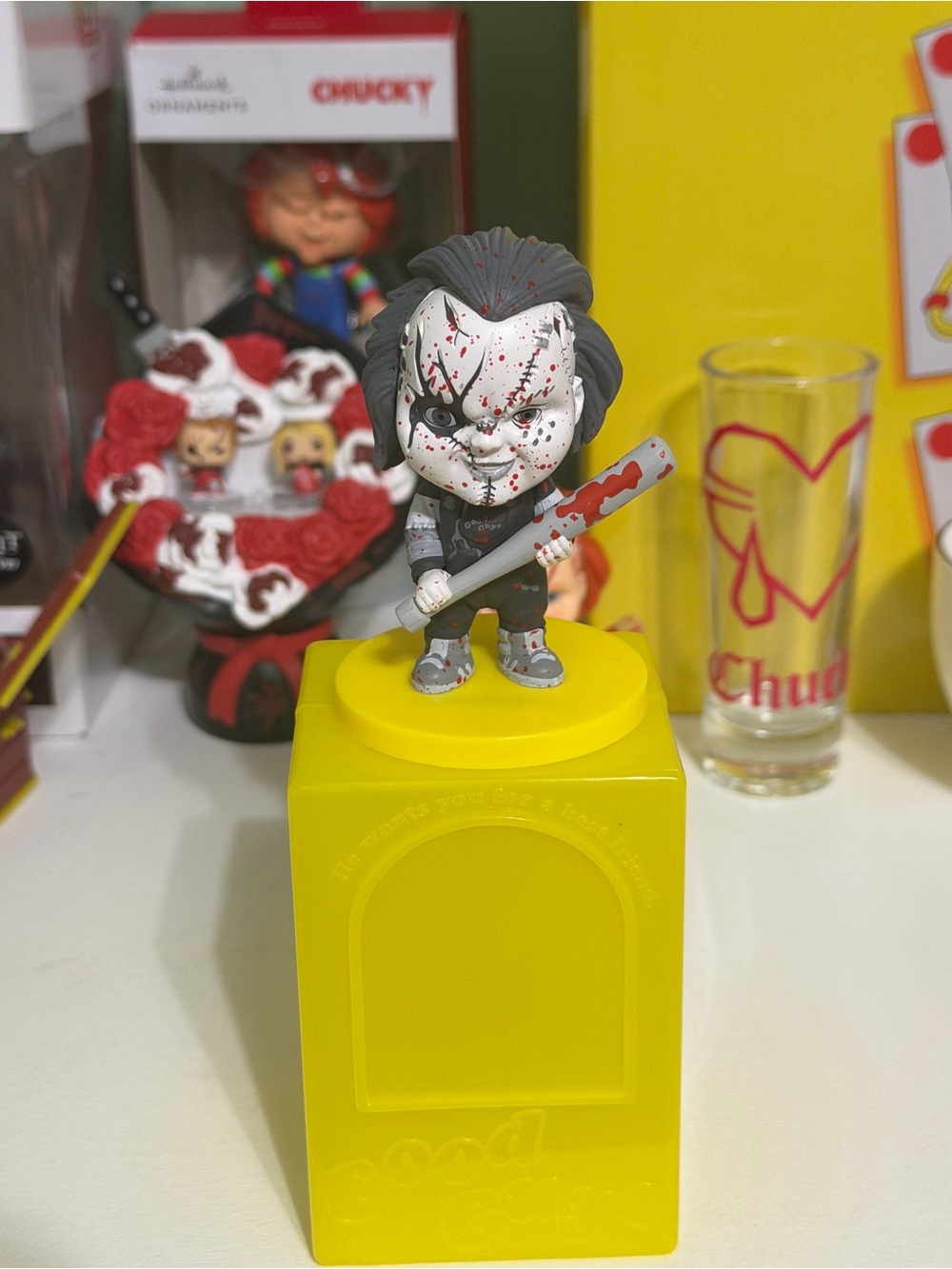 Funko Chucky Figure with Yellow Base and Red Splatter